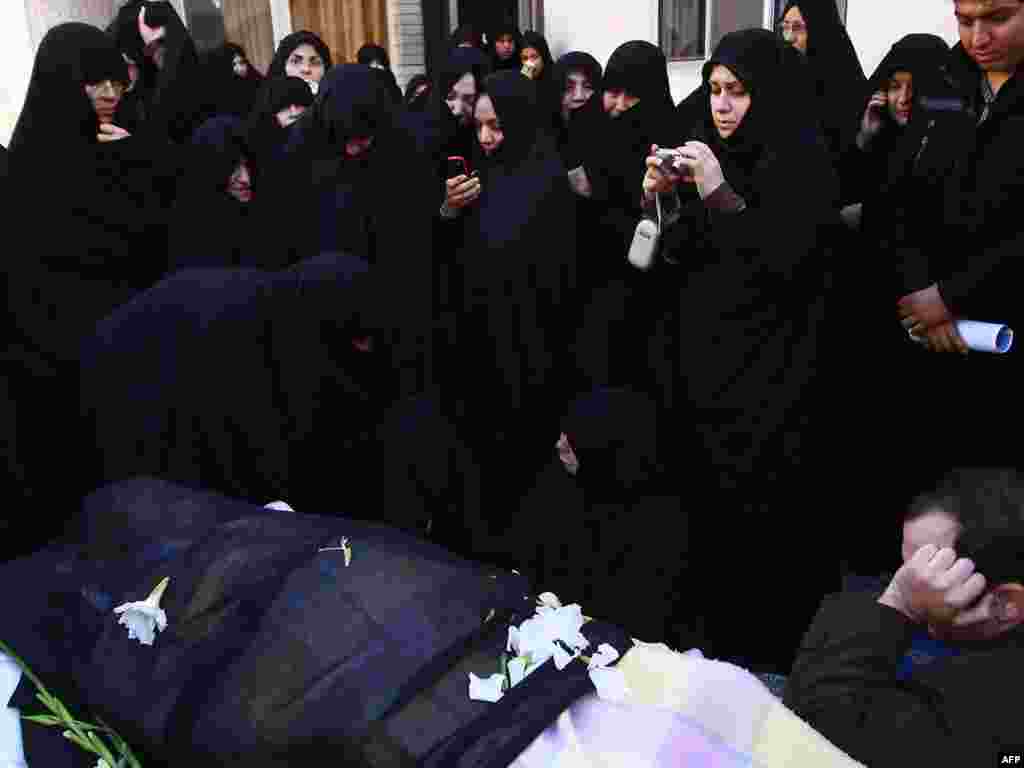 Many of the mourners began arriving in Qom on December 20, a day before his funeral.