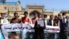 شماری از فعالان مدنی در برابر کنسولگری ایران در هرات دست به اعتراض زدند