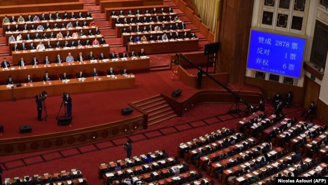 Результаты голосования за Закон о безопасности для Гонконга во время завершающей сессии Всекитайского собрания народных представителей (парламента). Пекин, 28 марта 2020 года