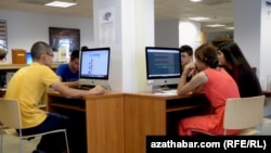 Turkmenistan. internet cafe . students are using macbook and other computers