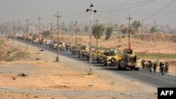 Iraqi troops are amassing south of Mosul as they ready a campaign to retake the city from Islamic State.