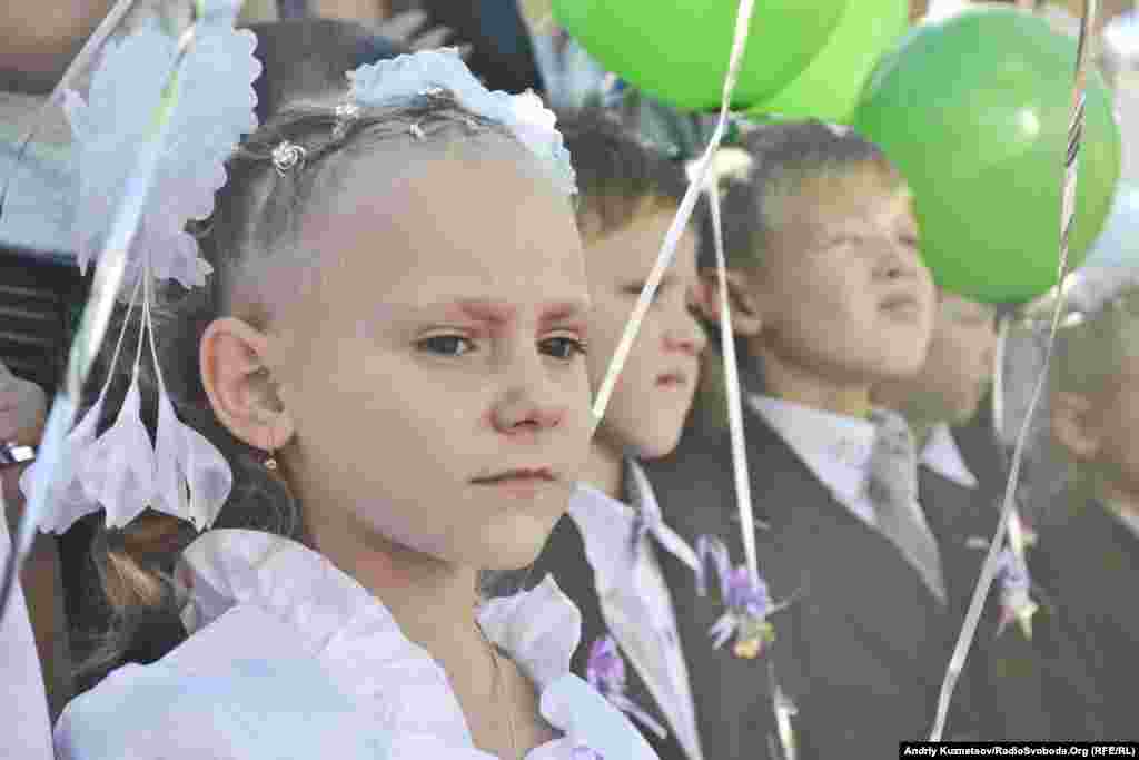 Six-year-old Alina Kalunuchenko on her first day at School No. 42 in Lugansk, Ukraine. 