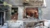 Ուկրաինա - Մարտական գործողությունների հետևանքով ավերակների վերածված շենք Հորլիվկա բնակավայրում, 27-ը հուլիսի, 2014թ․
