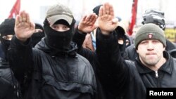 Ultranationalists march during a demonstration on the outskirts of Moscow.