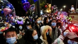 Novogodišnje slavlje u Vuhanu, kineskom gradu iz kojeg je u decembru 2019. počelo širenje korona virusa (31. decembar 2020.)