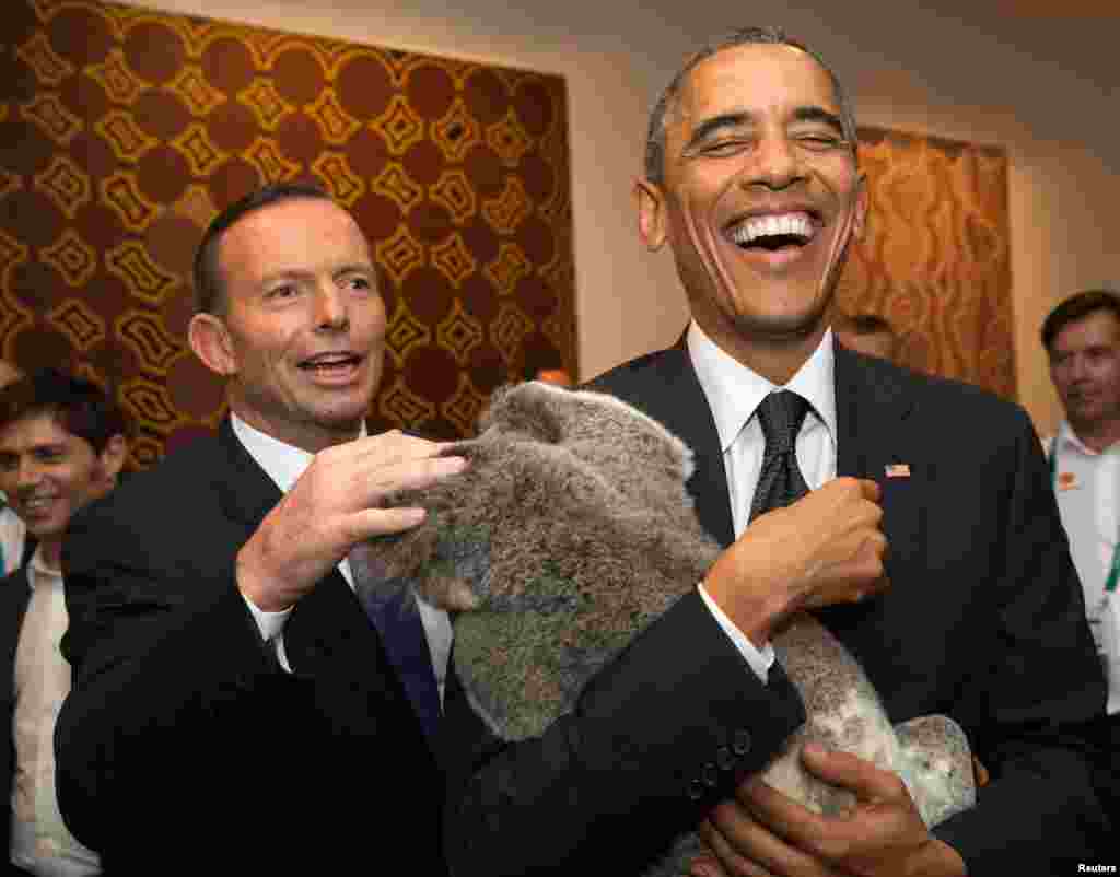 Австралия премьер-министрі Тони Эббот (сол жақта) пен АҚШ президенті Барак Обама.