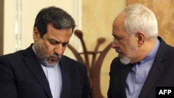 Министр иностранных дел Ирана Мохаммад Джавад Зариф (справа), его заместитель Аббас Аракчи.