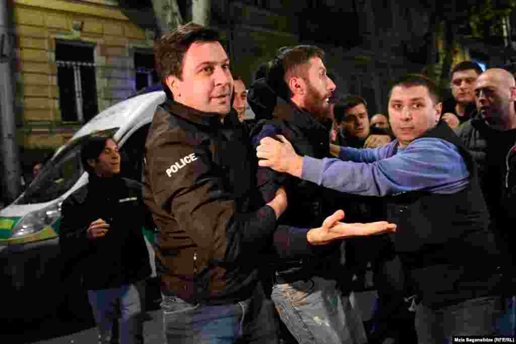 A demonstrator is arrested in Tbilisi. At least five protestors were detained on various charges.&nbsp;