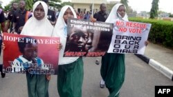 Nigerian schoolgirls take part in a rally calling for the release of the missing girls at the state government house in Lagos on May 5.