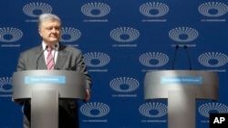 Ukraine -- Ukrainian President Petro Poroshenko delivers his speech ahead of the presidential elections on April 21, at the Olympic stadium in Kiev, Ukraine, Sunday, April 14, 2019