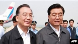 Chinese Premier Wen (left) and President Hu are leading the talks.