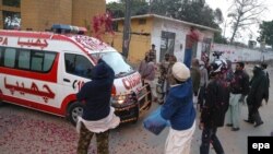 An ambulance transports the body of an executed prisoner in Karachi on January 15.