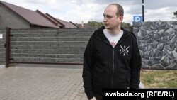 Eduard Palchys takes part in a protest against the building of a restaurant near the Kurapaty memorial to the victims of Stalinist repressions outside Minsk in 2018.