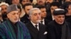 FILE: Afghan President Mohammad Ashraf Ghani (R), Afghan chief executive Abdullah Abdullah (C) and Afghan former president Hamid Karzai (L) during a ceremony in February 2019.