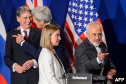 British Foreign Secretary Philip Hammond (left), U.S. Secretary of State John Kerry, EU foreign policy chief Federica Mogherini, and Iranian Foreign Minister Muhammad Javad Zarif at the announcement of "key parameters" agreed on a future nuclear deal with Tehran.