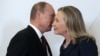 Putin Dismisses Clinton's Hitler Comparison With Sexist Jab