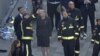 Британский премьер-министр Тереза Мэй на месте пожара (Лондон, 14 июня 2017 г.)