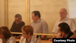 Акжанат Аминов, Серик Сапаргали и Владимир Козлов во время суда. Актау, август 2012 года.