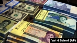 Valuta iraniane, rial.