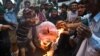 Activists from the Pakistani Peoples Party (PPP) burn an effigy of Indian Prime Minister Narendra Modi during an anti-Indian protest in Karachi on March 1.