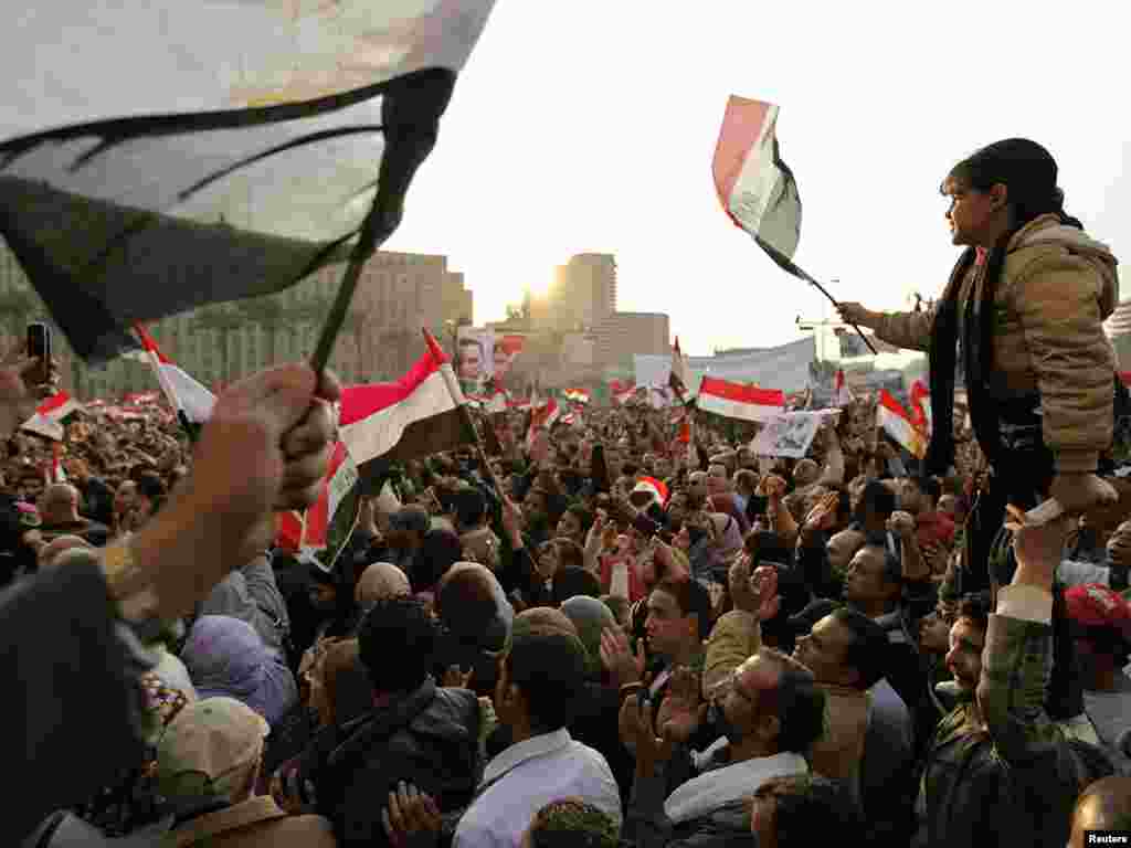 Protesters chant antigovernment slogans during mass demonstrations in Tahrir Square on February 8.