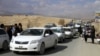 Members of Hazara minority from Malistan and Jaghuri districts of restive Ghazni province arrive in the provincial capital Ghazni to take refuge on November 12.