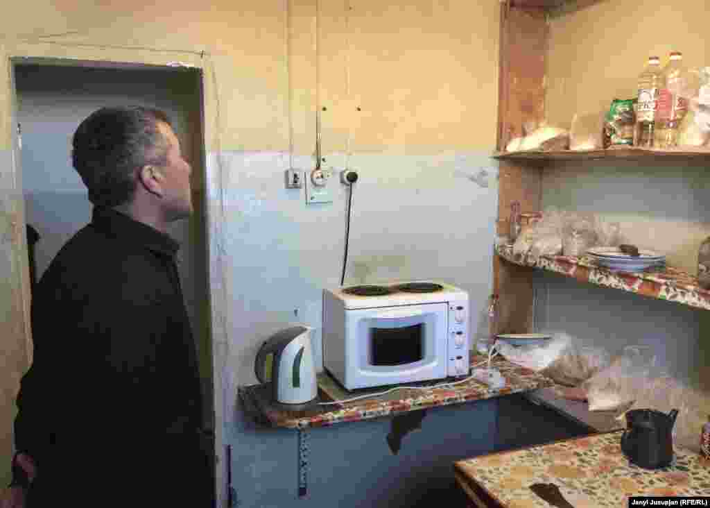 In the kitchen. Ibrahim cooked plov, a Central Asian rice meal, for migrant workers at the hostel. &nbsp;