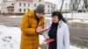 Belarus - RFE/RL journalist Dzmitry Hurnievic donates his books after his presentation was foiled, 08.02.20