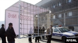 Opposition protesters used cages in their demonstrations