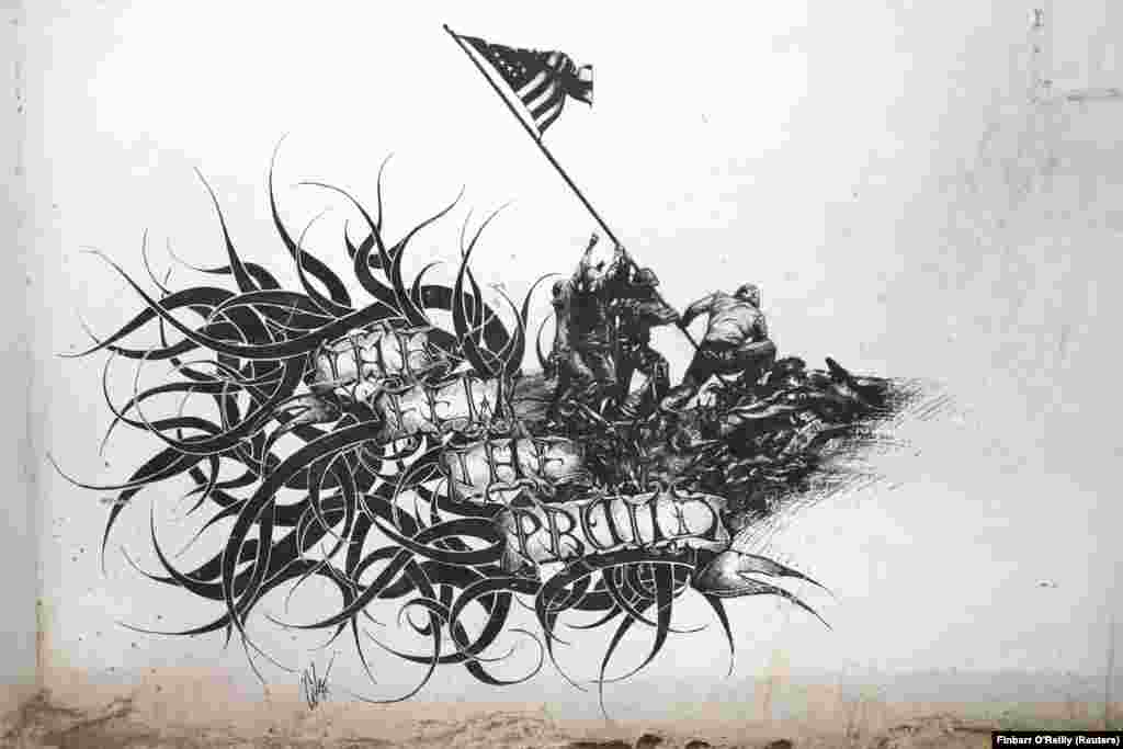 In the same Helmand compound, U.S. Marines decorated the walls with their own art after capturing the base in 2010.&nbsp;A drawing of Marines raising the U.S. flag inside the compound. The text says, &ldquo;THE FEW THE PROUD.&rdquo;