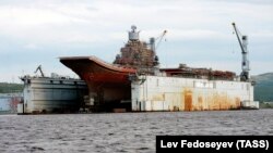 The Admiral Kuznetsov aircraft carrier is seen in the PD-50 dry dock in the village of Roslyakovo in 2011.