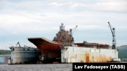 The Admiral Kuznetsov aircraft carrier is shown at PD-50 shipyard in Roslyakovo in 2011.