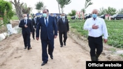 Tajikistan initially claimed there were no coronavirus cases in the country and President Emomali Rahmon (center) flouted warnings by international experts.