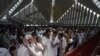 Pakistani Muslims offer first Friday Prayers during the Muslim fasting month of Ramadan at the Grand Faisal Mosque in Islamabad. (AFP/Aamir Qureshi)