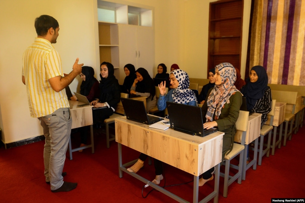 Female students attend a class to learn coding in the western Afghan city of Herat before the Taliban takeover. (file photo)