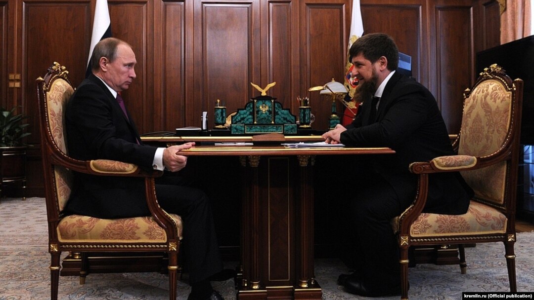 Russian President Vladimir Putin talking to Chechen leader Ramzan Kadyrov on March 25 in the Kremlin.