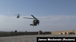 NATO helicopters land at Afghan and U.S. Special Forces base in Deh Bala district in the eastern province of Nangarhar in July 7 2018.