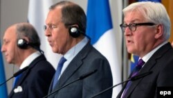 Germany -- (L-R) Foreign Ministers of France, Laurent Fabius, of Russia, Sergei Lavrov, of Germany, Frank-Walter Steinmeier (SPD) and of Ukraine, Pavlo Klimkin, during a press conference in Berlin, July 2, 2014