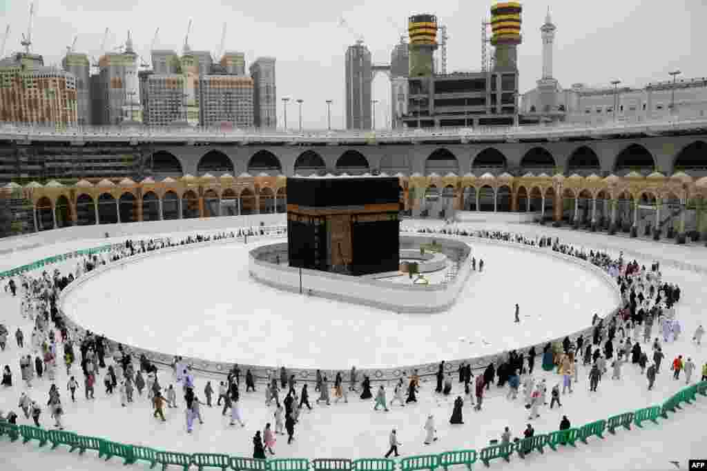 Muslim worshippers circumambulate the sacred Kaaba in Mecca's Grand Mosque, Islam's holiest site, on March 13. (AFP)