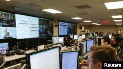 U.S. Department of Homeland Security analysts work at the National Cybersecurity & Communications Integration Center (NCCIC) located in Arlington, Virginia. (file photo)