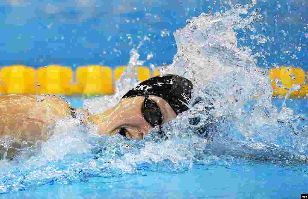 Katie Ledecky of the United States on her way to winning the women's 400-meter freestyle final. She broke her own world record set two years ago.