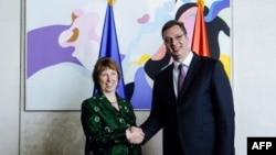 New Serbian Prime Minister Aleksandar Vucic (right) welcomes EU foreign policy chief Catherine Ashton in Belgrade on April 28.