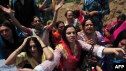 Pakistani eunuchs and transgenders demonstrate for their rights in the city of Peshawar in 2011. 