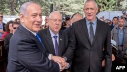 بنیامین نتانیاهو، چپ، رهبر حزب لیکود، و بنی گانتس، راست، رهبر حزب آبی- سفید