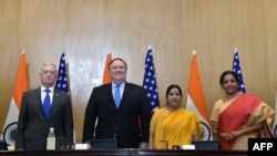 This handout photo from India's Ministry of External Affairs taken on September 6, 2018 shows US Secretary of Defense Jim Mattis (L), US Secretary of State Mike Pompeo (2L), Indian Foreign Minister Sushma Swaraj (2R) and Indian Defense Minister Nirmala Si