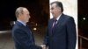 How close to Russian President Vladimir Putin (left) does Tajik President Emomali Rahmon want to get?
