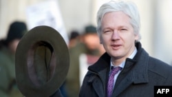 WikiLeaks founder Julian Assange arrives for a London court hearing in February.