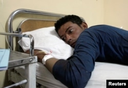 A police cadet who was injured in an attack on the center, lies in a hospital in Quetta, Pakistan on October 25, 2016.