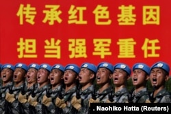 Шеруге қатысып жатқан Қытай әскерилері. Пекин, 1 қазан 2019 жыл.