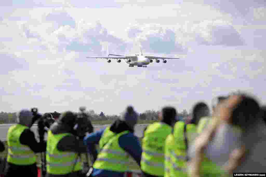 Media line up to film the An-225 landing in Warsaw on April 14 stuffed with millions of items of personal protective equipment. Thousands of people reportedly turned out to watch the unique aircraft&#39;s arrival and one video of the April 14 landing has been viewed nearly 2 million times. &nbsp;